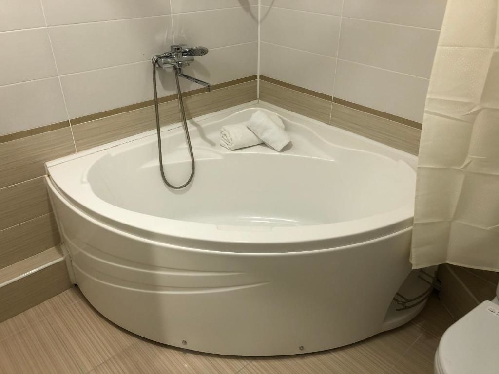 Апарт-отели Loft Apartments Shymkent Шымкент