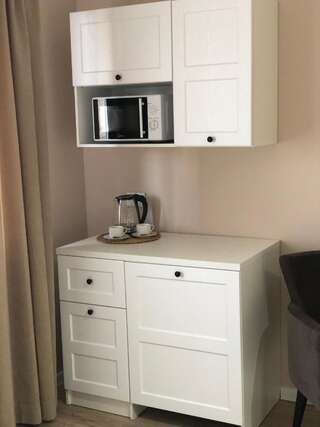 Апарт-отели Loft Apartments Shymkent Шымкент Улучшенные апартаменты-13